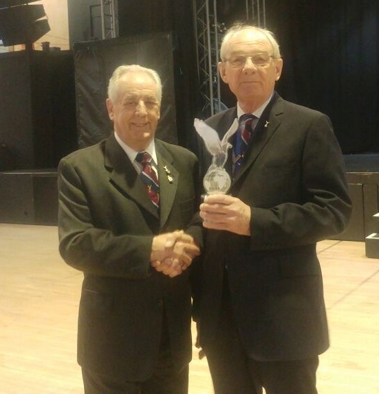 Former branch Chairman Ted Bates (left) receives the Area President's Trophy